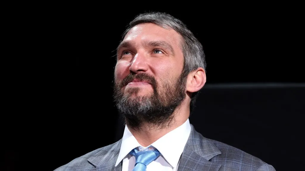 Alex Ovechkin #8 of the Washington Capitals looks on during a ceremony honoring him for becoming third all time in goals scored in the NHL before the start of the Capitals and New York Islanders at Capital One Arena on April 26, 2022 in Washington, DC.