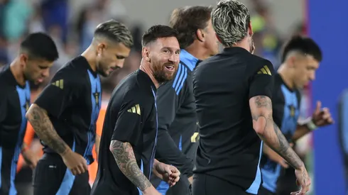 Lionel Messi of Argentina smiles as he speaks to Rodrigo De Paul of Argentina before during the FIFA World Cup 2026 South American Qualifier match between Argentina and Bolivia.