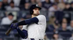 J.C. Escarra #25 of the New York Yankees follows through on his seventh inning double against the Arizona Diamondbacks at Yankee Stadium on April 03, 2025 in New York City. The hit was Escarra's first in the major leagues.