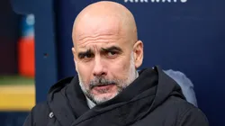 Pep Guardiola, Manager of Manchester City, looks on prior to the Premier League match between Manchester City FC and Brighton & Hove Albion FC at Etihad Stadium on March 15, 2025 in Manchester, England.