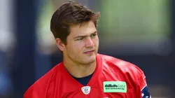 Drake Maye #10 of the New England Patriots walks to the field during the New England Patriots OTA Offseason Workout on May 29, 2024.