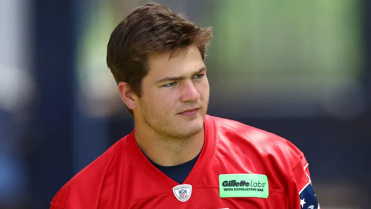 Drake Maye #10 of the New England Patriots walks to the field during the New England Patriots OTA Offseason Workout on May 29, 2024.