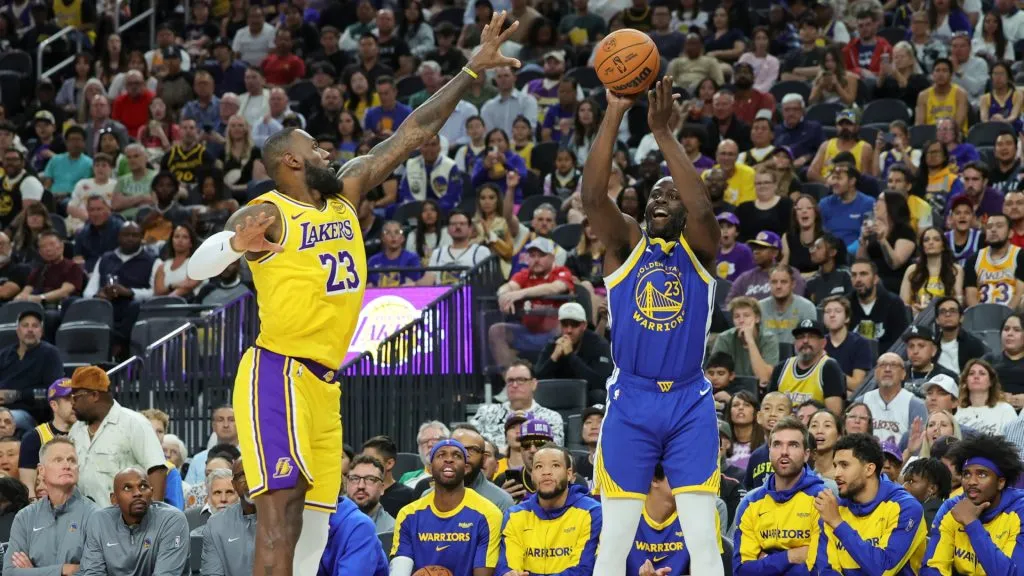 Draymond Green #23 of the Golden State Warriors shoots a 3-pointer against LeBron James #23 of the Los Angeles Lakers. (Ethan Miller/Getty Images)