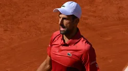 Novak Djokovic of Serbia reacts after he is distracted by a member of the crowd during his match against Francisco Cerundolo.
