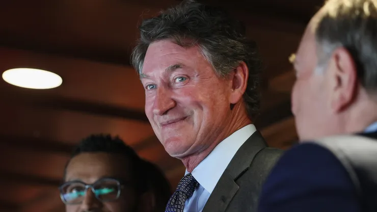 : Wayne Gretzky acknowledges the fans during the game between the Washington Capitals and the Chicago Blackhawks at Capital One Arena on April 04, 2025 in Washington, DC.