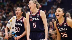Kaitlyn Chen #20, Paige Bueckers #5 and Azzi Fudd #35 of the UConn Huskies react in the fourth quarter against the UCLA Bruins in the Final Four game of the NCAA Women's Basketball Tournament at Amalie Arena on April 04, 2025 in Tampa, Florida.