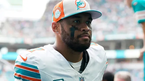 Tua Tagovailoa #1 of the Miami Dolphins runs off the field at the end of first half against the New England Patriots at Hard Rock Stadium on October 29, 2023 in Miami Gardens, Florida.