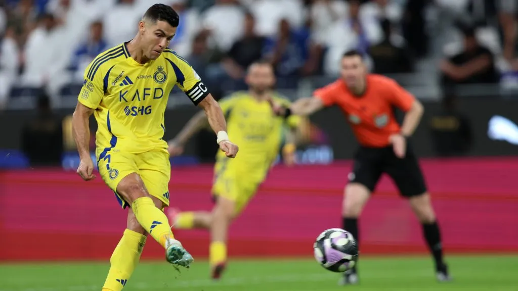 Cristiano Ronaldo of Al Nassr scores his team’s third goal from the penalty spot during the Saudi Pro League match between Al Hilal v Al Nassr. (Yasser Bakhsh/Getty Images)
