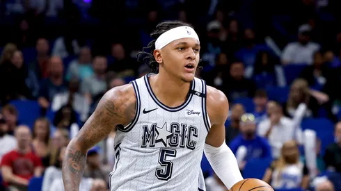 Paolo Banchero #5 of the Orlando Magic brings the ball up court during the first half of the game against the Dallas Mavericks