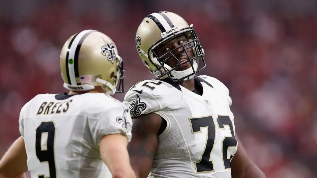 GLENDALE, AZ – SEPTEMBER 13:  Tackle Terron Armstead #72 of the New Orleans Saints talks with quarterback Drew Brees #9 during the NFL game against the Arizona Cardinals at the University of Phoenix Stadium on September 13, 2015 in Glendale, Arizona.  The Cardinals defeated the Saints 31-19.  (Photo by Christian Petersen/Getty Images)
