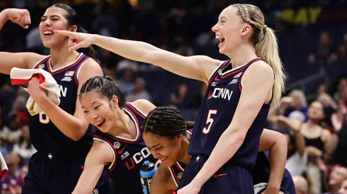 Paige Bueckers and the Huskies celebrating