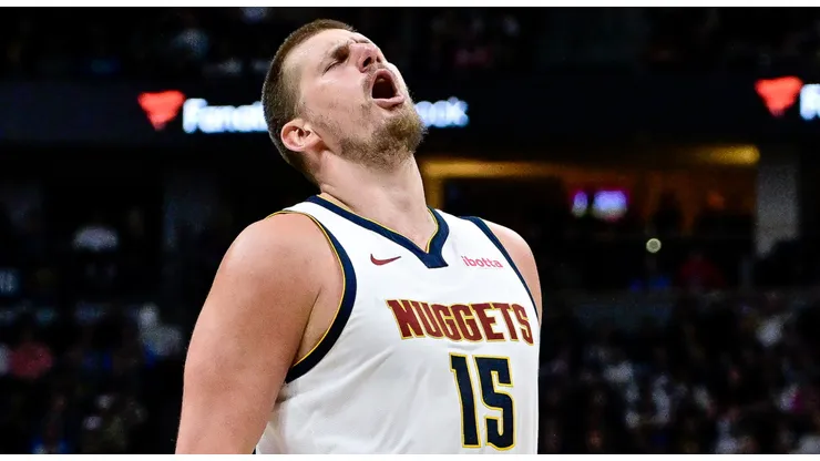 Nikola Jokic #15 of the Denver Nuggets reacts after making a shot in the first half against the Minnesota Timberwolves at Ball Arena on April 1, 2025 in Denver, Colorado.