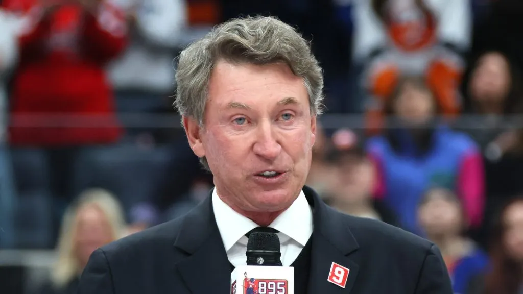 Former NHL player Wayne Gretzky speaks during the celebration after Alex Ovechkin #8 of the Washington Capitals scores his 895th career goal during the second period against the New York Islanders at UBS Arena on April 06, 2025 in Elmont, New York. Ovechkin's goal passes Gretzky's 894 goals to become the NHL all-time goal-scoring leader.