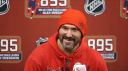 Alex Ovechkin #8 of the Washington Capitals answers questions following his record-setting 895th career goal during the second period against the New York Islanders at UBS Arena on April 06, 2025 in Elmont, New York. Ovechkin's goal passes Wayne Gretzky's 894 goals to become the NHL all-time goal-scoring leader.