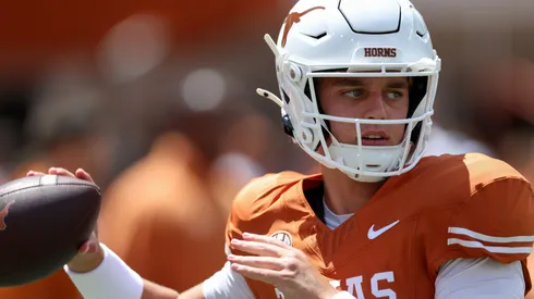 Arch Manning #16 of the Texas Longhorns throws a pass before the game against the Colorado State Rams at Darrell K Royal-Texas Memorial Stadium on August 31, 2024 in Austin, Texas.