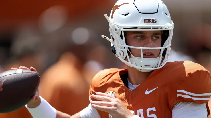 Arch Manning #16 of the Texas Longhorns throws a pass before the game against the Colorado State Rams at Darrell K Royal-Texas Memorial Stadium on August 31, 2024 in Austin, Texas.