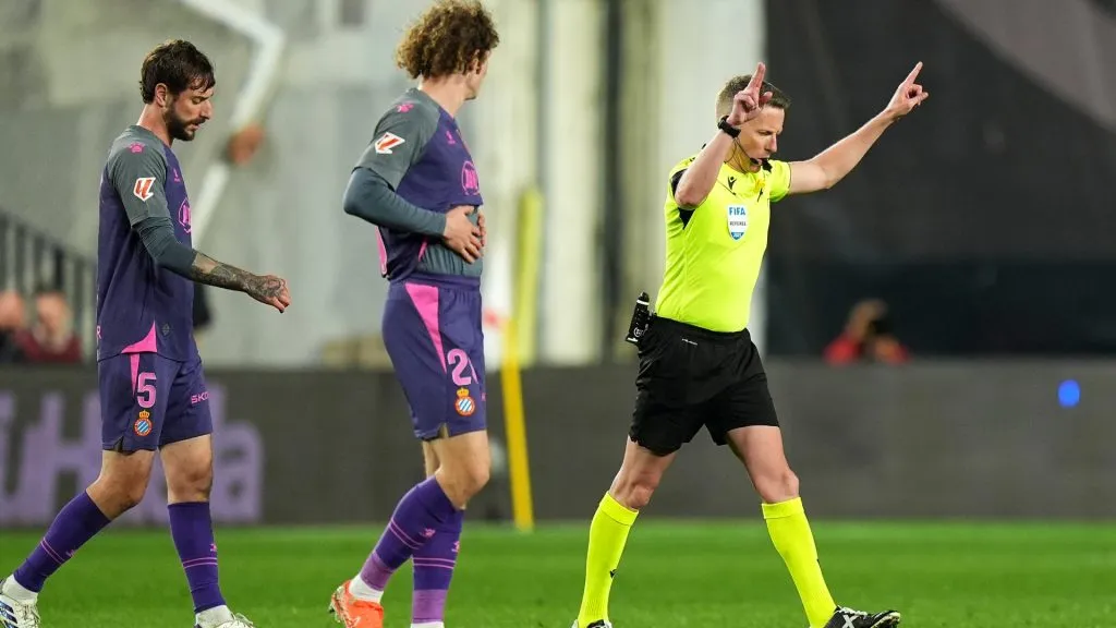 Match Referee Alejandro Hernandez gestures after a VAR review before awarding a penalty to RCD Espanyol during the LaLiga match between Rayo Vallecano and RCD Espanyol de Barcelona in 2025. (Source: Angel Martinez/Getty Images)