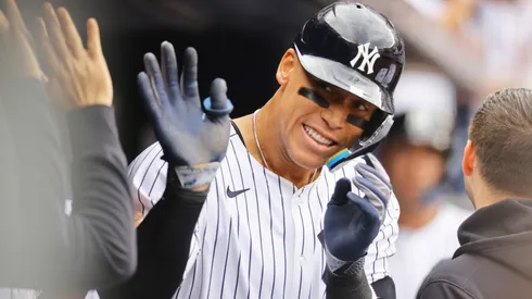 Aaron Judge #99 of the New York Yankees celebrates after hitting a two run home run in the fourth inning against the Milwaukee Brewers at Yankee Stadium on March 29, 2025 in New York City.