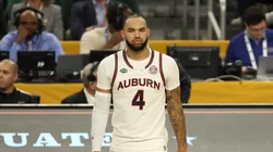 Johni Broome #4 of the Auburn Tigers walks the court during the first half in the Final Four game of the NCAA Men's Basketball Tournament against the Florida Gators at the Alamodome on April 05, 2025 in San Antonio, Texas.