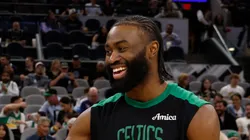 Chris Paul #3 of the San Antonio Spurs greets Jaylen Brown #7 of the Boston Celtics before the start of their game