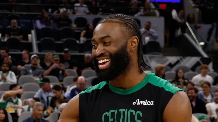 Chris Paul #3 of the San Antonio Spurs greets Jaylen Brown #7 of the Boston Celtics before the start of their game