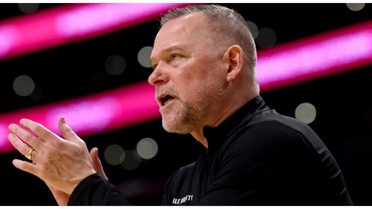 Head coach Michael Malone of the Denver Nuggets cheers after a play during the second quarter against the Los Angeles Lakers at Crypto.com Arena on March 19, 2025 in Los Angeles, California.