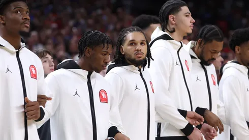 Emanuel Sharp #21 of the Houston Cougars stands for the National Anthem prior to the National Championship of the NCAA Men's Basketball Tournament against the Florida Gators at the Alamodome on April 07, 2025 in San Antonio, Texas.