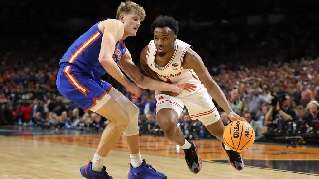 SAN ANTONIO, TEXAS – APRIL 07: L.J. Cryer #4 of the Houston Cougars drives the ball against Thomas Haugh #10 of the Florida Gators during the second half in the National Championship of the NCAA Men’s Basketball Tournament at the Alamodome on April 07, 2025 in San Antonio, Texas. (Photo by Jamie Squire/Getty Images)