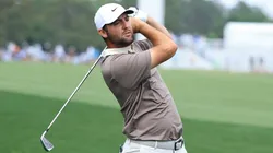 Scottie Scheffler of the United States hits from the rough on the 14th hole during the final round of the Texas Children's Houston Open 2025.