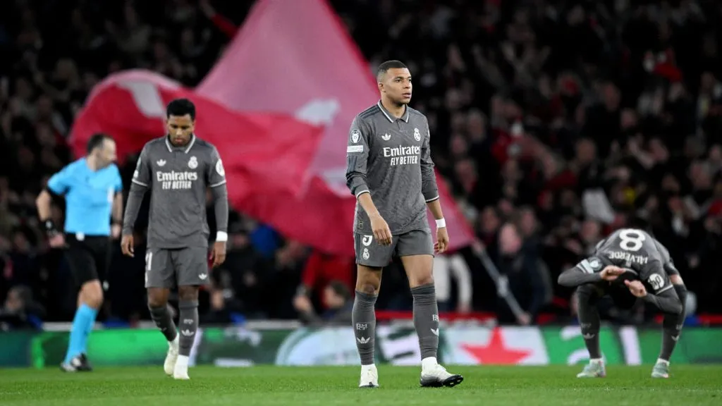 Kylian Mbappe of Real Madrid looks dejected after Mikel Merino of Arsenal (not pictured) scores his team's third goal during the UEFA Champions League 2024/25 Quarter Final First Leg match.