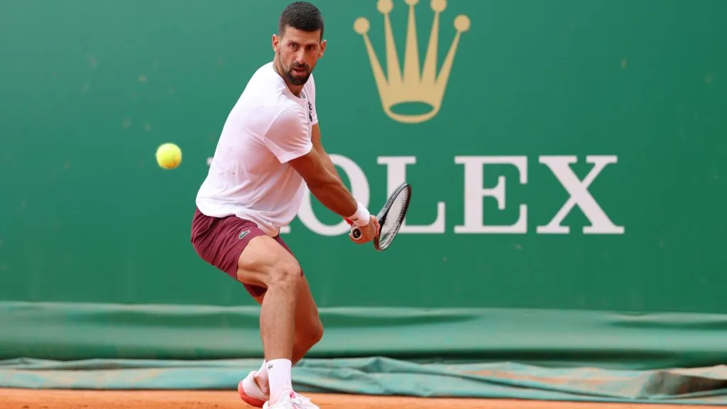 Novak Djokovic of Serbia plays a backhand on the practice courts during day one of the Rolex Monte-Carlo Masters. (Clive Brunskill/Getty Images)