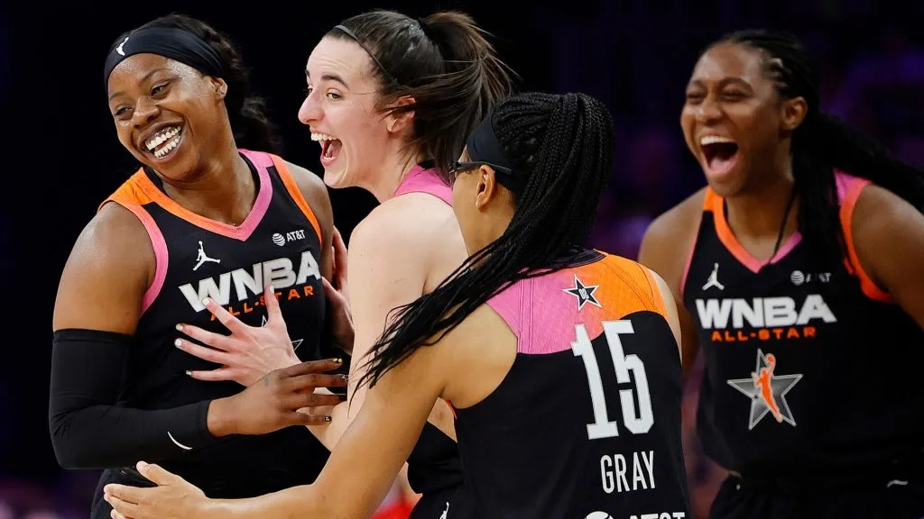Arike Ogunbowale #24 celebrates a three point basket with Caitlin Clark #22 and Allisha Gray #15 of Team WNBA in the second half against Team USA during the 2024 WNBA All Star Game. (Source: Alex Slitz/Getty Images)