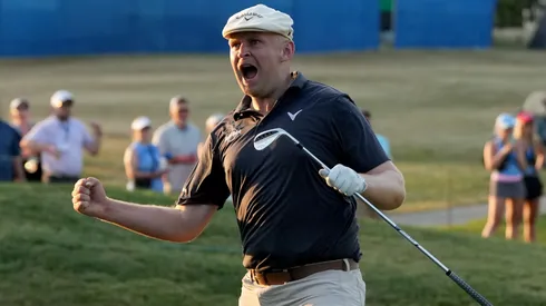 Harry Hall of England reacts after chipping in for a birdie on the ninth green during the third playoff hole during the final round of the Kentucky Championship at Keene Trace Golf Club on July 14, 2024.