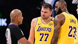 Luka Doncic #77 and Lebron James #23 of the Los Angeles Lakers speak to an official during the second half against the Oklahoma City Thunder.