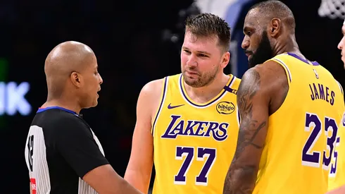 Luka Doncic #77 and Lebron James #23 of the Los Angeles Lakers speak to an official during the second half against the Oklahoma City Thunder.