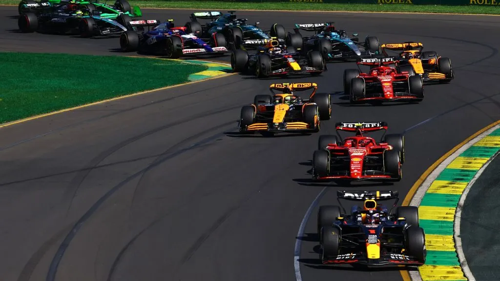 Max Verstappen driving the Oracle Red Bull Racing RB20 leads Carlos Sainz driving the Ferrari SF-24 and the rest of the field at the start of the race during the F1 Grand Prix in 2024. (Source: Mark Thompson/Getty Images)