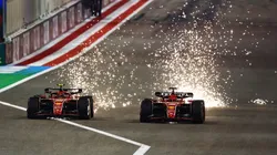 Sparks fly from the cars of Carlos Sainz driving the Ferrari SF-24 and Charles Leclerc driving the Ferrari SF-24 as they compete for track position during the F1 Grand Prix of Bahrain in 2024.