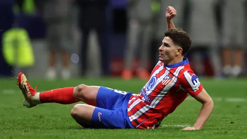 Julian Alvarez of Atletico de Madrid watches his shot as scores the team's second penalty in the penalty shoot out, which is later ruled out following a VAR Review against Real Madrid.