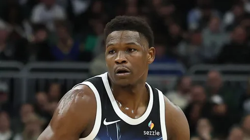 Anthony Edwards #5 of the Minnesota Timberwolves handles the ball during a game against the Milwaukee Bucks