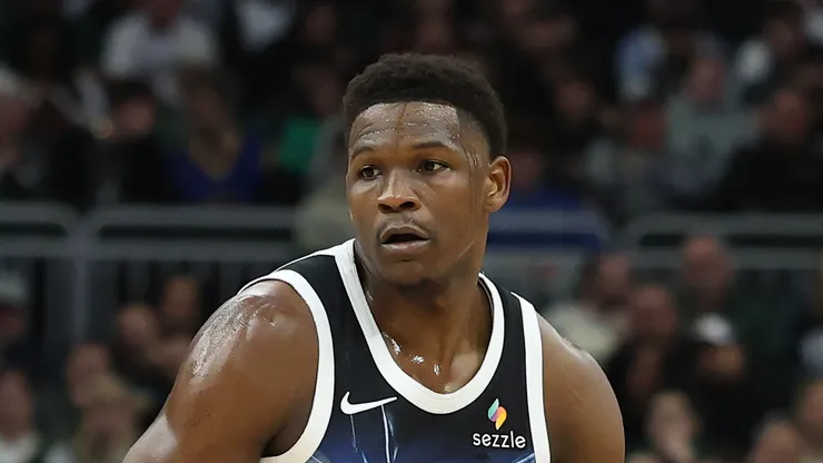 Anthony Edwards #5 of the Minnesota Timberwolves handles the ball during a game against the Milwaukee Bucks