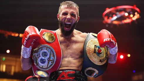 Anthony Cacace poses for a photo with the title belts after victory over Joe Cordina following the IBF and IBO World Super Featherweight titles' fight in 2024.