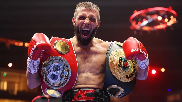 Anthony Cacace poses for a photo with the title belts after victory over Joe Cordina following the IBF and IBO World Super Featherweight titles' fight in 2024.