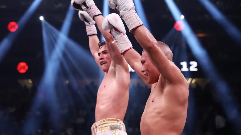Isaac Cruz and Giovanni Cabrera react following the WBA World Lightweight Title Eliminator & WBC Silver & WBO Latino Title bout at T-Mobile Arena on July 29, 2023. (Source: Al Bello/Getty Images)