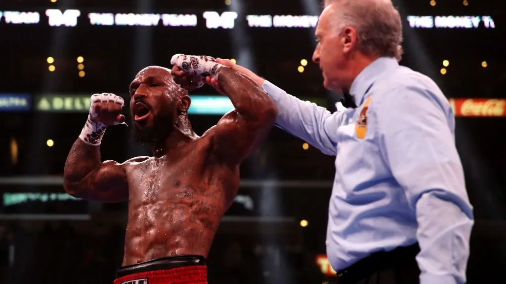 Vaughn Alexander (L) celebrates his split decision win against Luis Arias after their super welterweight bout at Staples Center on December 05, 2021. (Source: Katelyn Mulcahy/Getty Images)