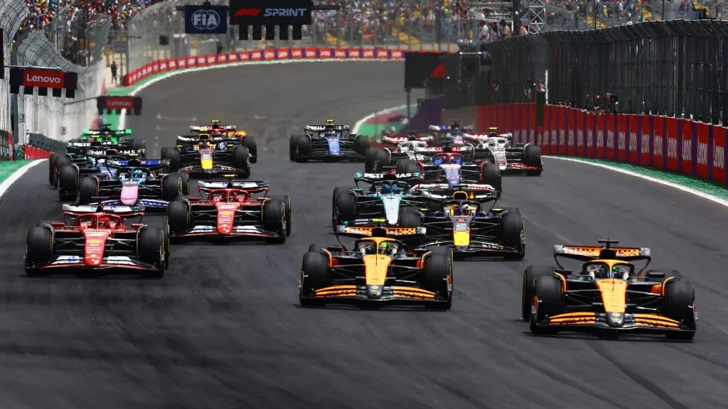 Oscar Piastri, Lando Norris and the rest of the field into turn one at the start during the Sprint ahead of the F1 Grand Prix of Brazil in 2024. (Source: Mark Thompson/Getty Images)