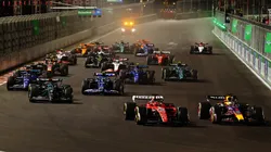 Max Verstappen of the Netherlands driving the (1) Oracle Red Bull Racing RB19 leads Charles Leclerc of Monaco driving the (16) Ferrari SF-23 at turn one during the F1 Grand Prix of Las Vegas.