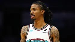 Ja Morant #12 of the Memphis Grizzlies looks on during the second half of a basketball game against the Charlotte Hornets.