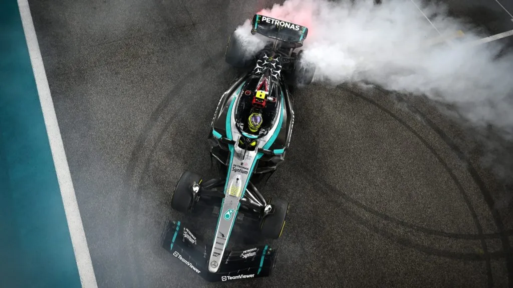 4th placed Lewis Hamilton of Great Britain driving the (44) Mercedes AMG Petronas F1 Team W15 does donuts on track to celebrate his final race with Mercedes in 2024. (Source: Clive Mason/Getty Images)