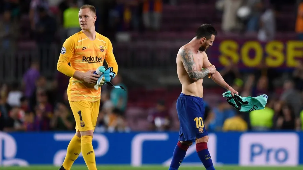 Marc-André ter Stegen and Lionel Messi after the UEFA Champions League group F match between FC Barcelona and FC Inter. (Alex Caparros/Getty Images)