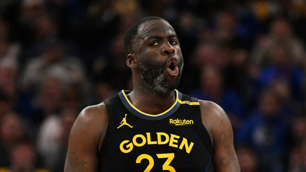 Draymond Green #23 of the Golden State Warriors celebrates his three-point basket against the San Antonio Spurs